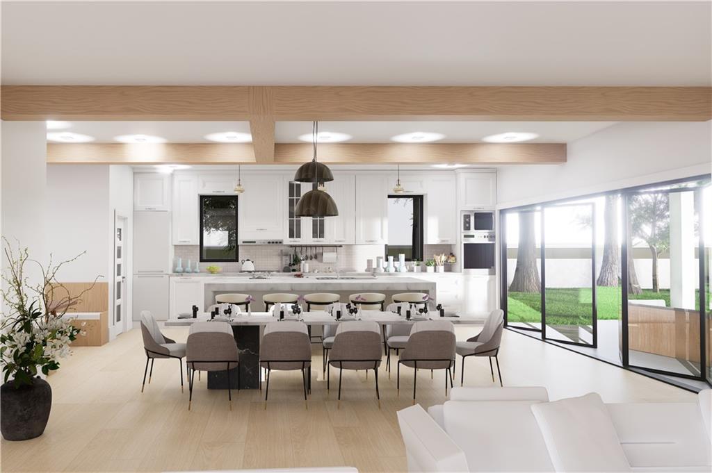 385 River Bend Road Dawsonville, GA 30534 - Photo 14 of 42 a large kitchen with a table and chairs