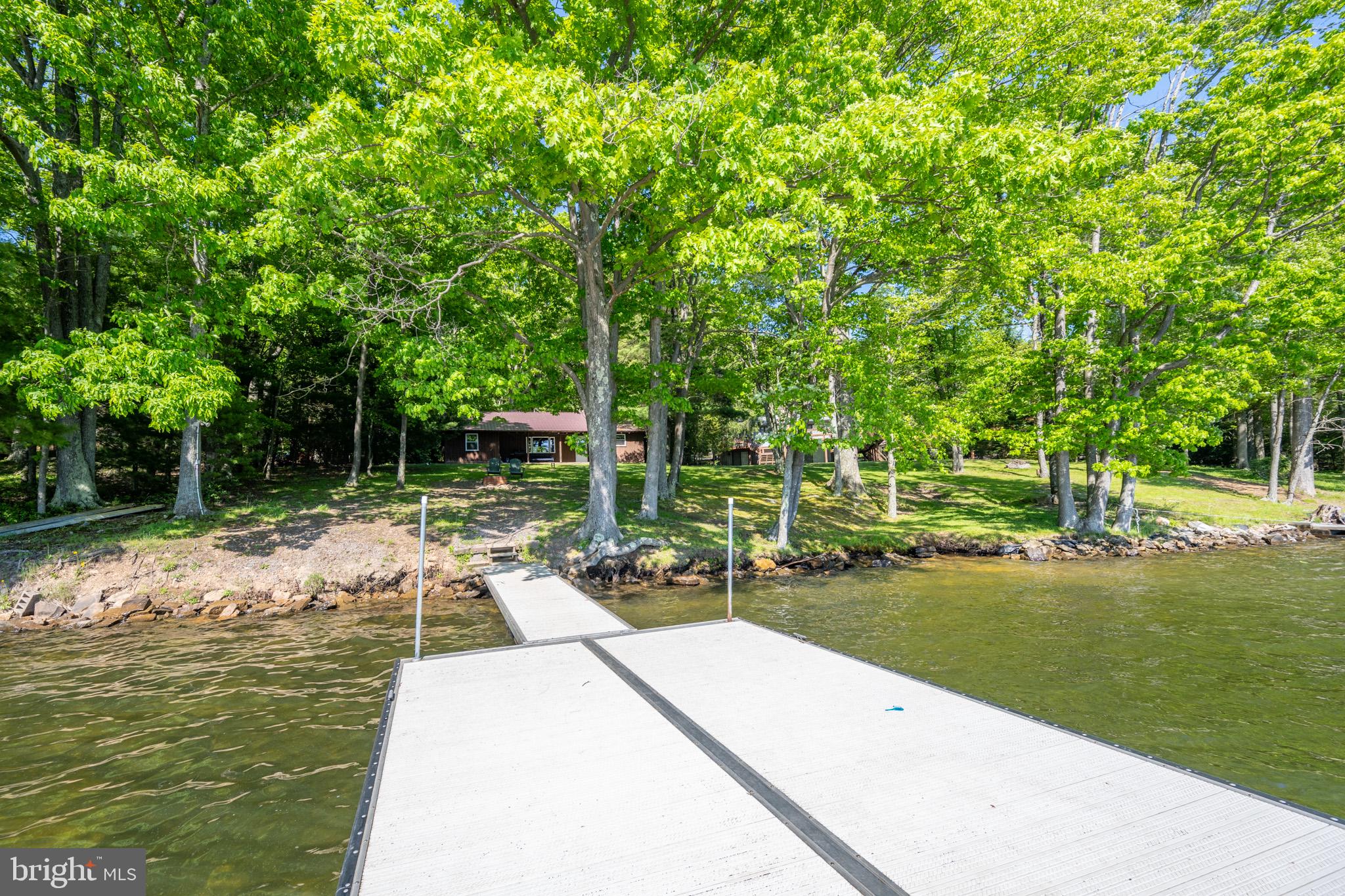 2187 State Park Road Swanton, MD 21561 - Photo 2 of 29 a view of yard with swimming pool and green space