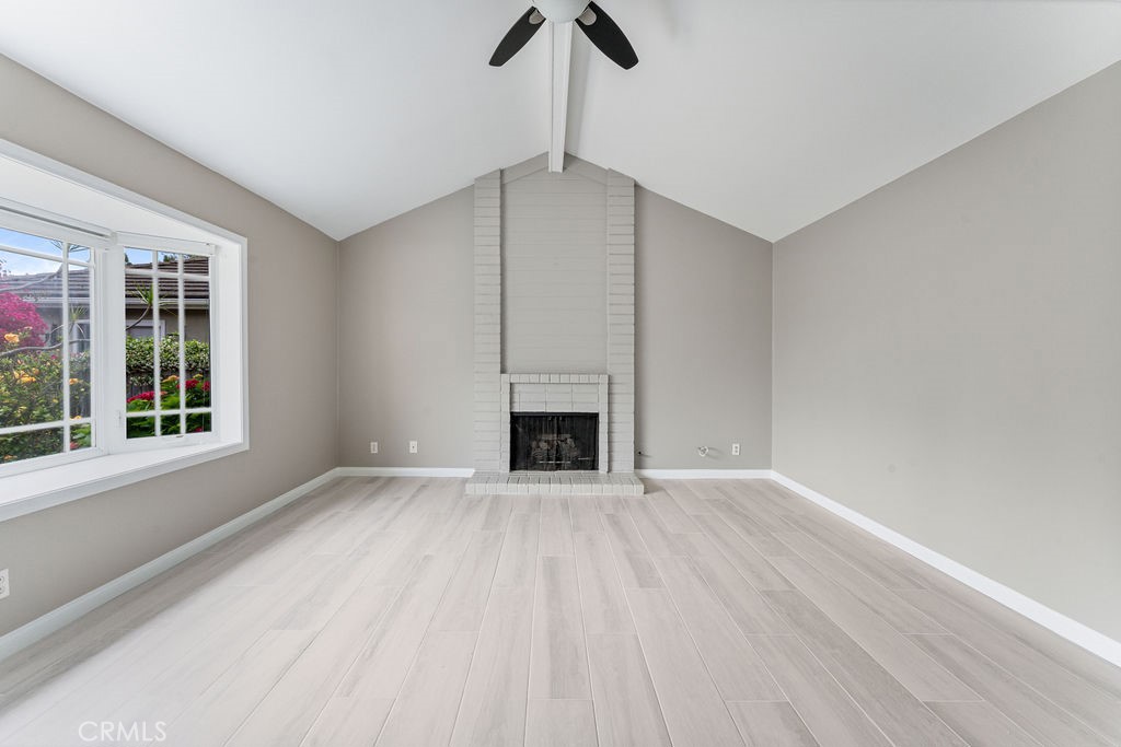25352 Hugo Road Laguna Niguel, CA 92677 - Photo 5 of 31 Living Room with Cozy Fireplace