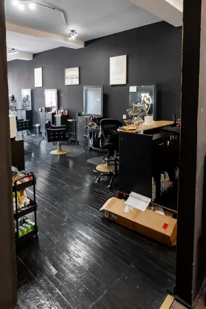 a living room filled with furniture and a flat screen tv