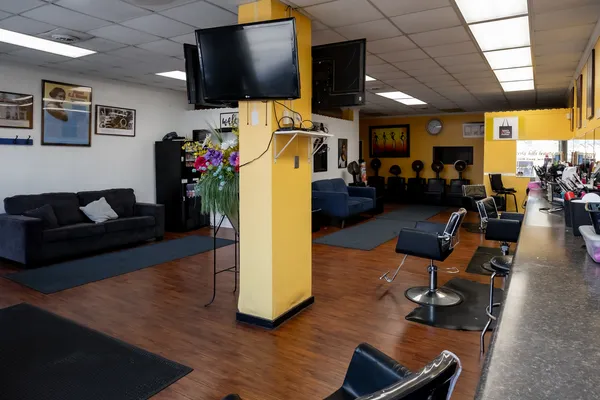 a view of a room with furniture and window