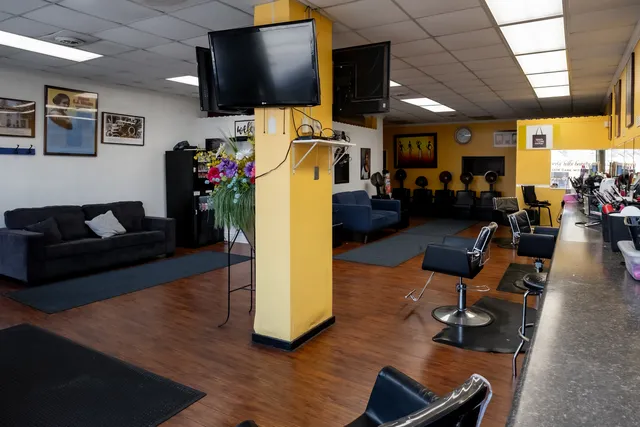 a view of a room with furniture and window