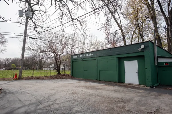 a view of street with parked cars
