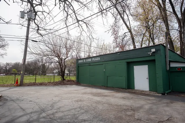 a view of street with parked cars