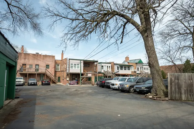 a front view of building with yard