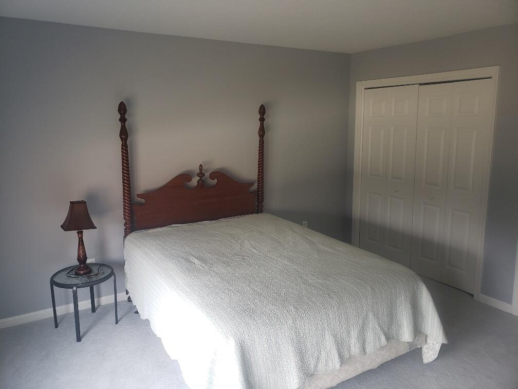 2086 Founding Way Road Bedford, VA 24523 - Photo 24 of 32 a bedroom with a bed and a table
