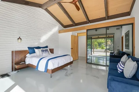 a kitchen with stainless steel appliances granite countertop a sink a stove and cabinets