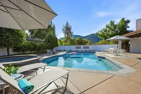 a house with trees in front of it