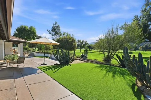 a view of a city with mountains in the background