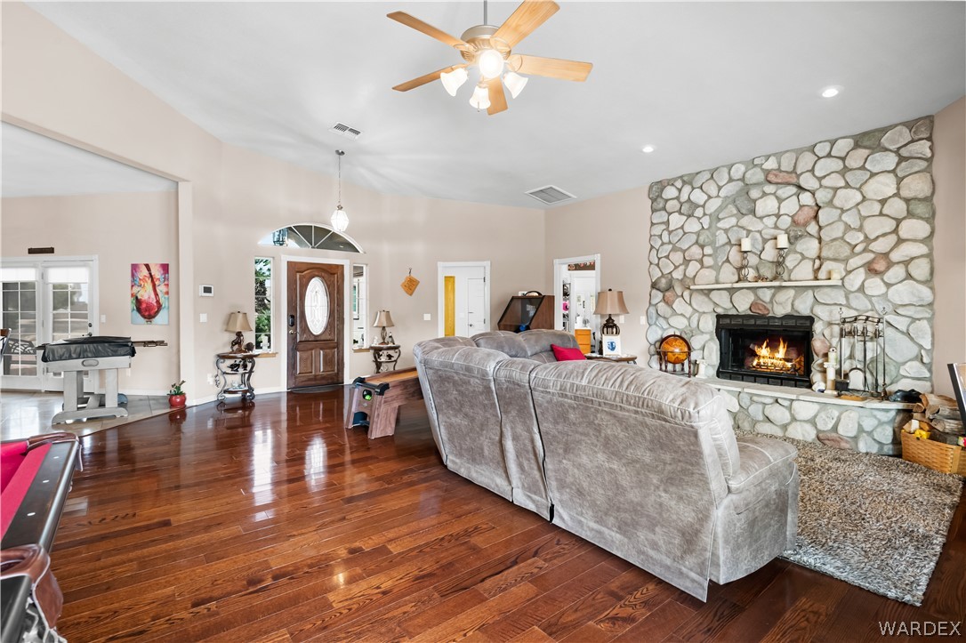 2898 Mountain Trail Road Kingman, AZ 86401 - Photo 4 of 75 a living room with furniture and a fireplace