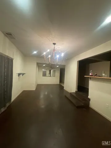 a view of a hallway with entryway