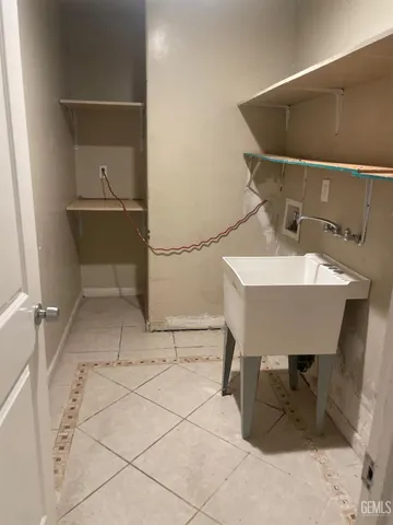a bathroom with a sink and mirror