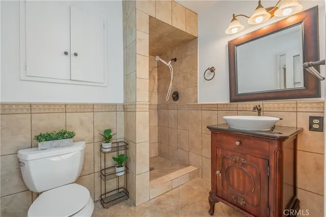 an aerial view of a house with a swimming pool