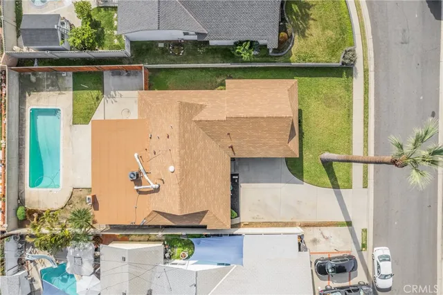 a view of swimming pool with a yard