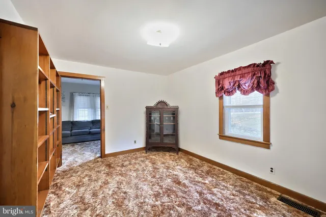 a bathroom with a sink and a large mirror