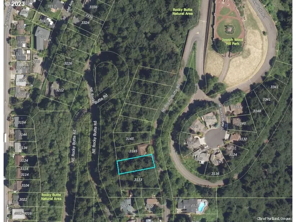 an aerial view of a highlighted house