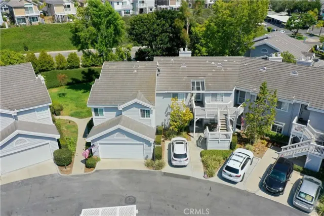 an aerial view of a house with garden
