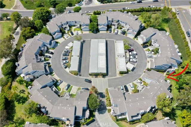 an aerial view of a house with outdoor space