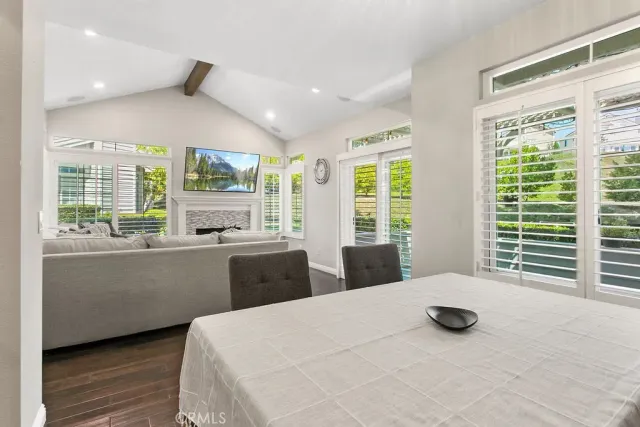 a kitchen with stainless steel appliances granite countertop a sink stove oven and refrigerator