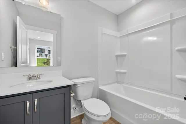 a balcony with view of swimming pool