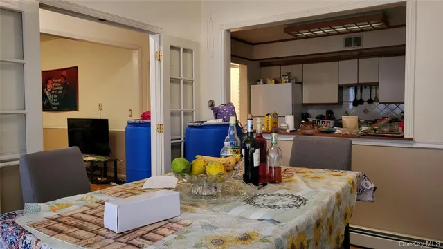 a living room with fireplace furniture and a flat screen tv