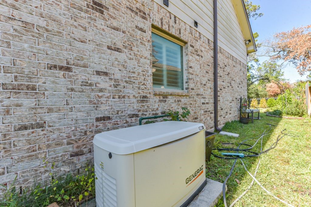 126 Keechie Creek Court Conroe, TX 77304 - Photo 14 of 50 a bathroom with a sink and garden