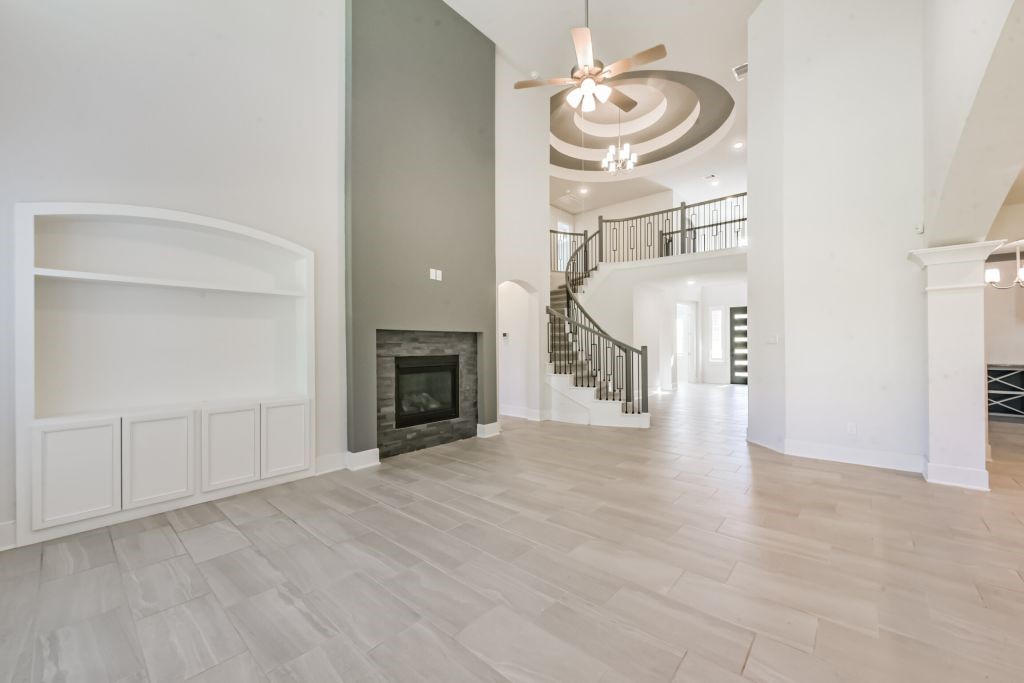 126 Keechie Creek Court Conroe, TX 77304 - Photo 20 of 50 a view of a livingroom with a fireplace