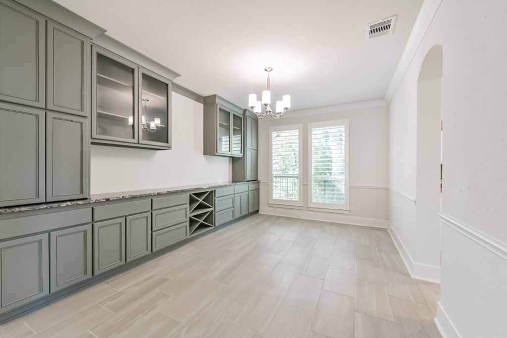 126 Keechie Creek Court Conroe, TX 77304 - Photo 29 of 50 a view of a kitchen with electric appliances