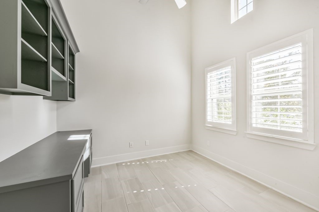 126 Keechie Creek Court Conroe, TX 77304 - Photo 37 of 50 a view of an empty room with a window