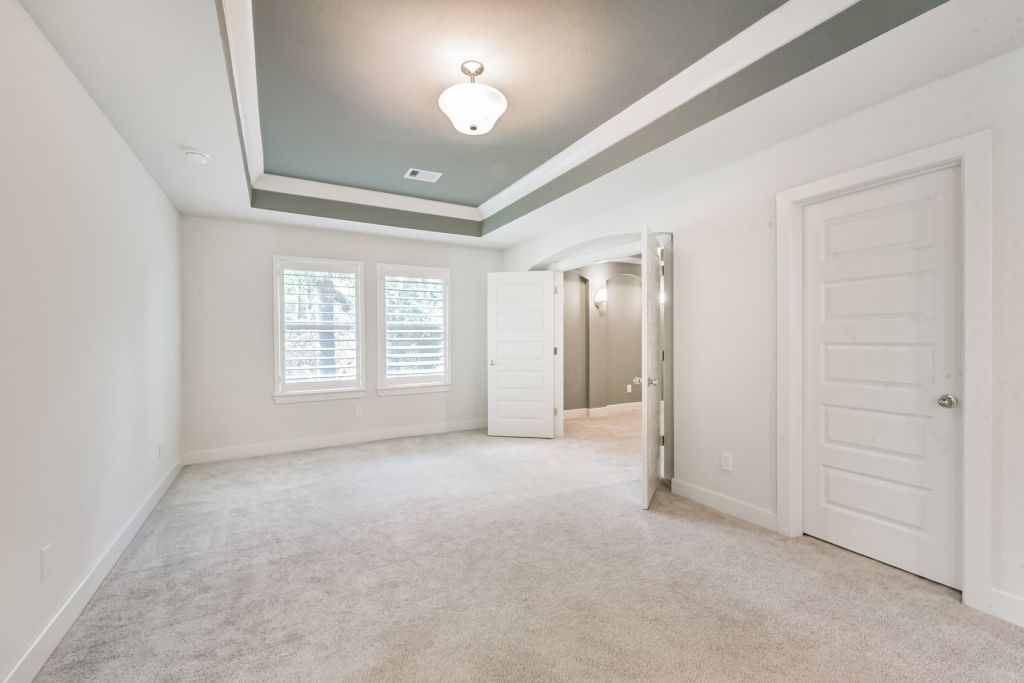 126 Keechie Creek Court Conroe, TX 77304 - Photo 42 of 50 an empty room with windows and closet
