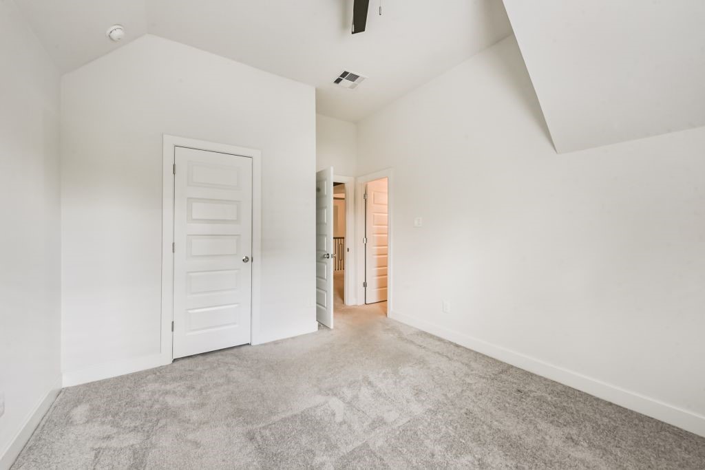 126 Keechie Creek Court Conroe, TX 77304 - Photo 46 of 50 an empty room with closet