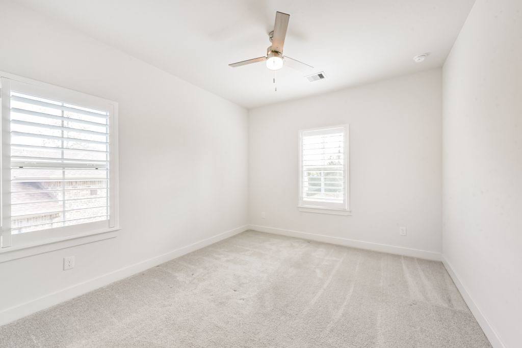 126 Keechie Creek Court Conroe, TX 77304 - Photo 48 of 50 an empty room with a window