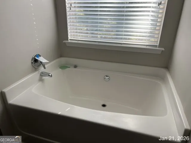 a bathroom with a bathtub