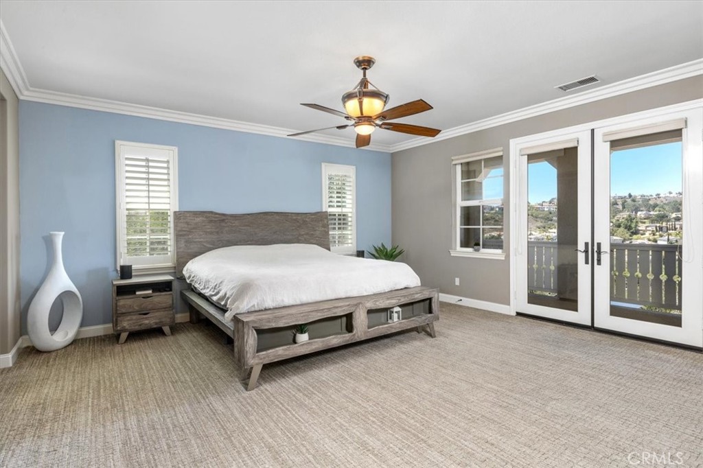 2453 Lapis Road Carlsbad, CA 92009 - Photo 30 of 74 Primary retreat with french doors that open to a balcony to enjoy your morning coffee.