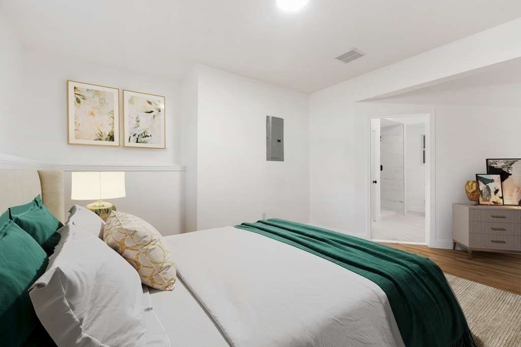 85 Jewell Street Mansfield, MA 02048 - Photo 23 of 42 a bedroom with a bed and a cabinets