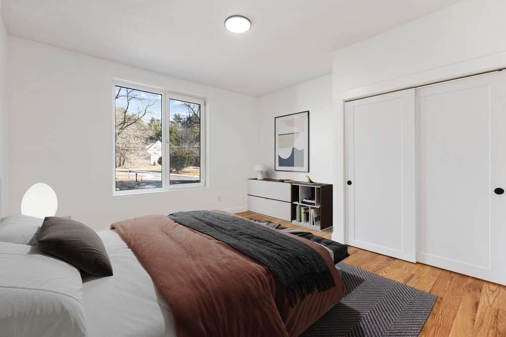 85 Jewell Street Mansfield, MA 02048 - Photo 27 of 42 a bedroom with a bed and a window