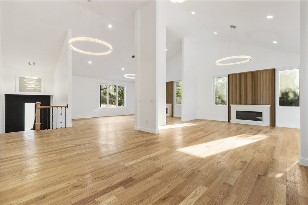85 Jewell Street Mansfield, MA 02048 - Photo 4 of 42 a view of a kitchen with a sink and a fireplace
