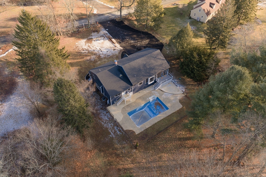 85 Jewell Street Mansfield, MA 02048 - Photo 41 of 42 an aerial view of a house with a yard