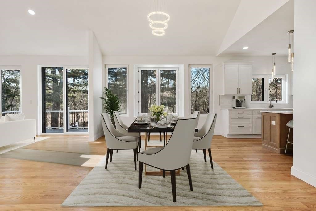 85 Jewell Street Mansfield, MA 02048 - Photo 7 of 42 a view of a dining room with furniture and wooden floor