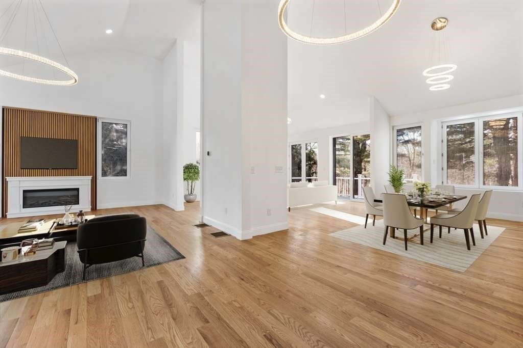 85 Jewell Street Mansfield, MA 02048 - Photo 9 of 42 a view of a dining room with furniture and wooden floor