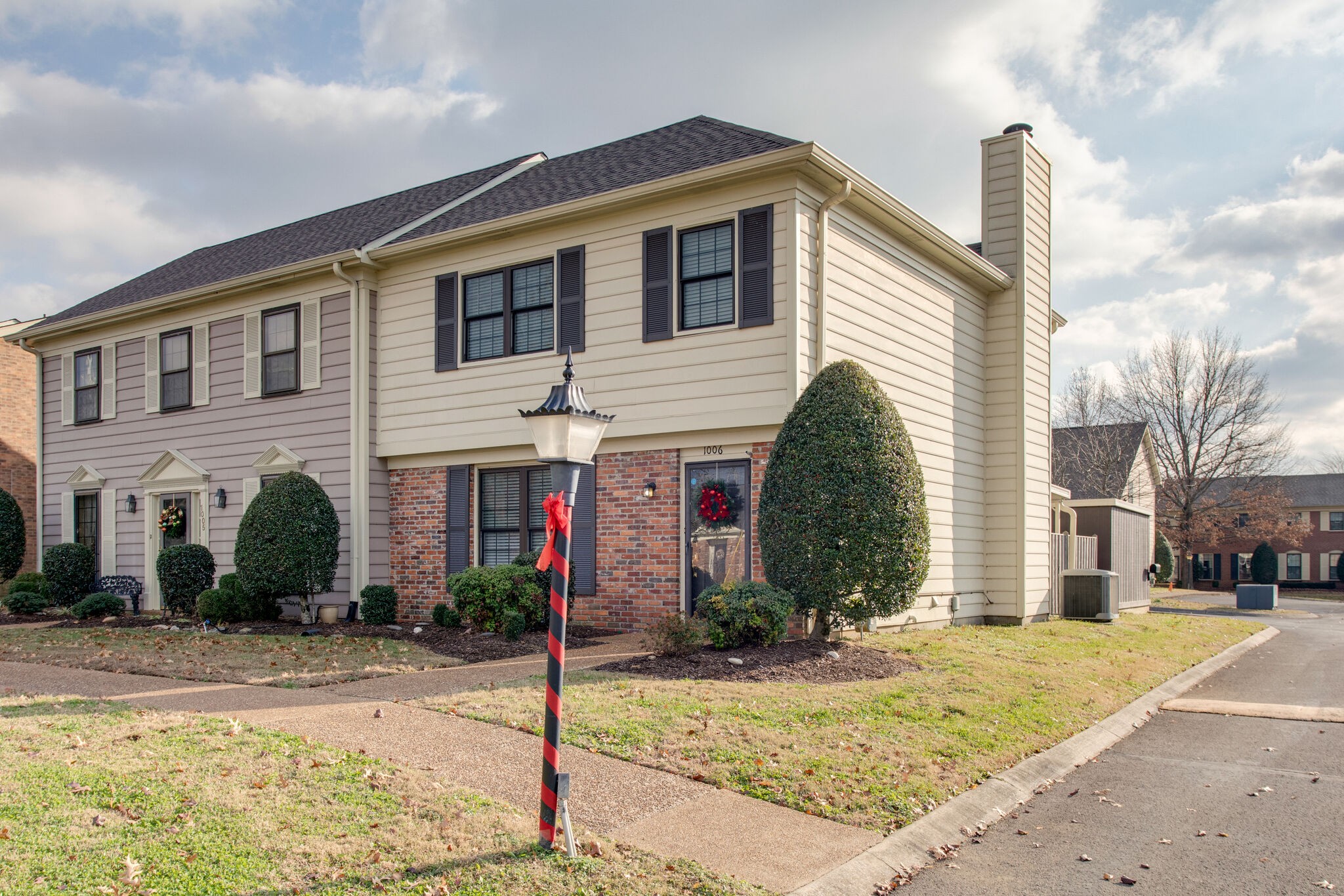 1006 General George Patton Road Nashville, TN 37221 - Photo 1 of 29 a front view of a house with garden