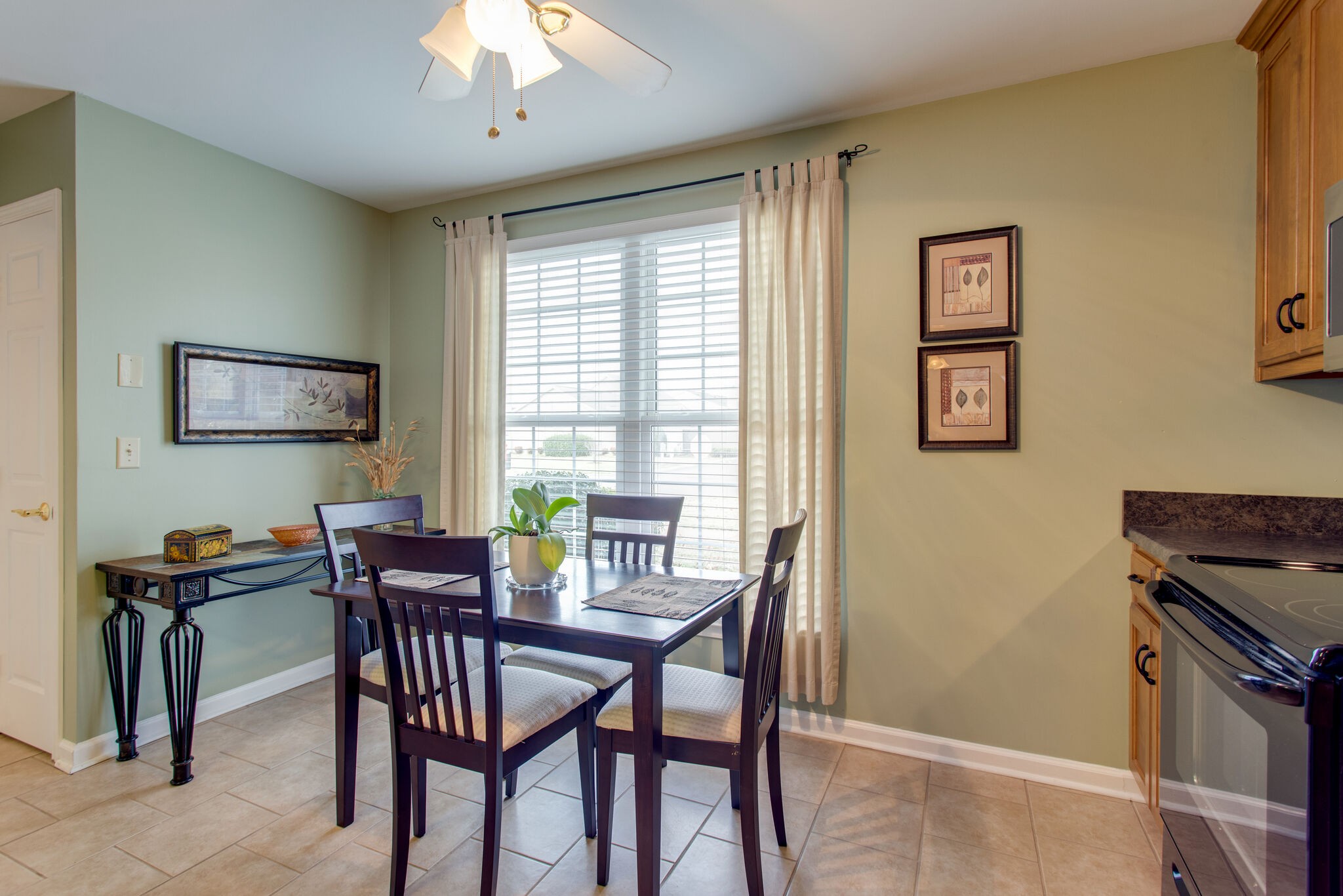 1006 General George Patton Road Nashville, TN 37221 - Photo 3 of 29 a view of a dining room with furniture and a window