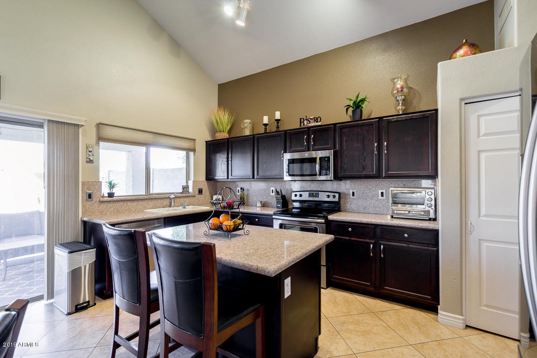 7020 West Phelps Road Peoria, AZ 85382 - Photo 11 of 35 Inviting Kitchen