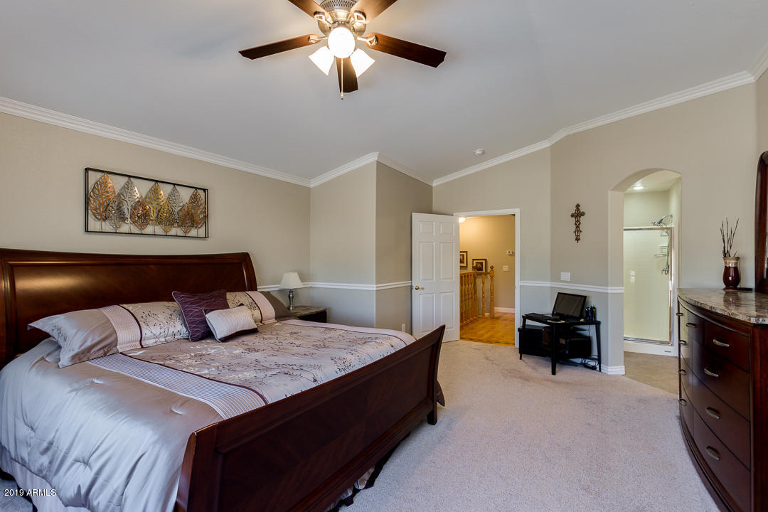 7020 West Phelps Road Peoria, AZ 85382 - Photo 19 of 35 Master Bedroom