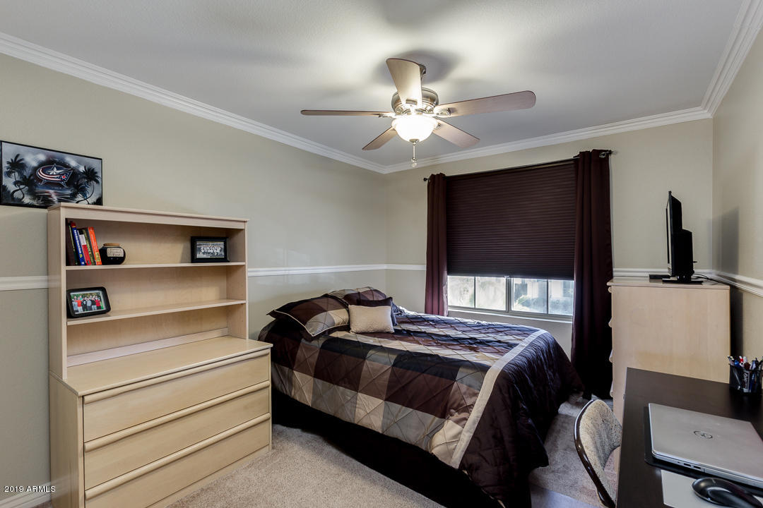 7020 West Phelps Road Peoria, AZ 85382 - Photo 25 of 35 Secondary Bedroom (upstairs)
