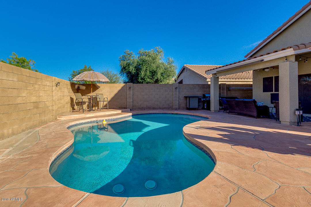 7020 West Phelps Road Peoria, AZ 85382 - Photo 29 of 35 Flagstone Deck