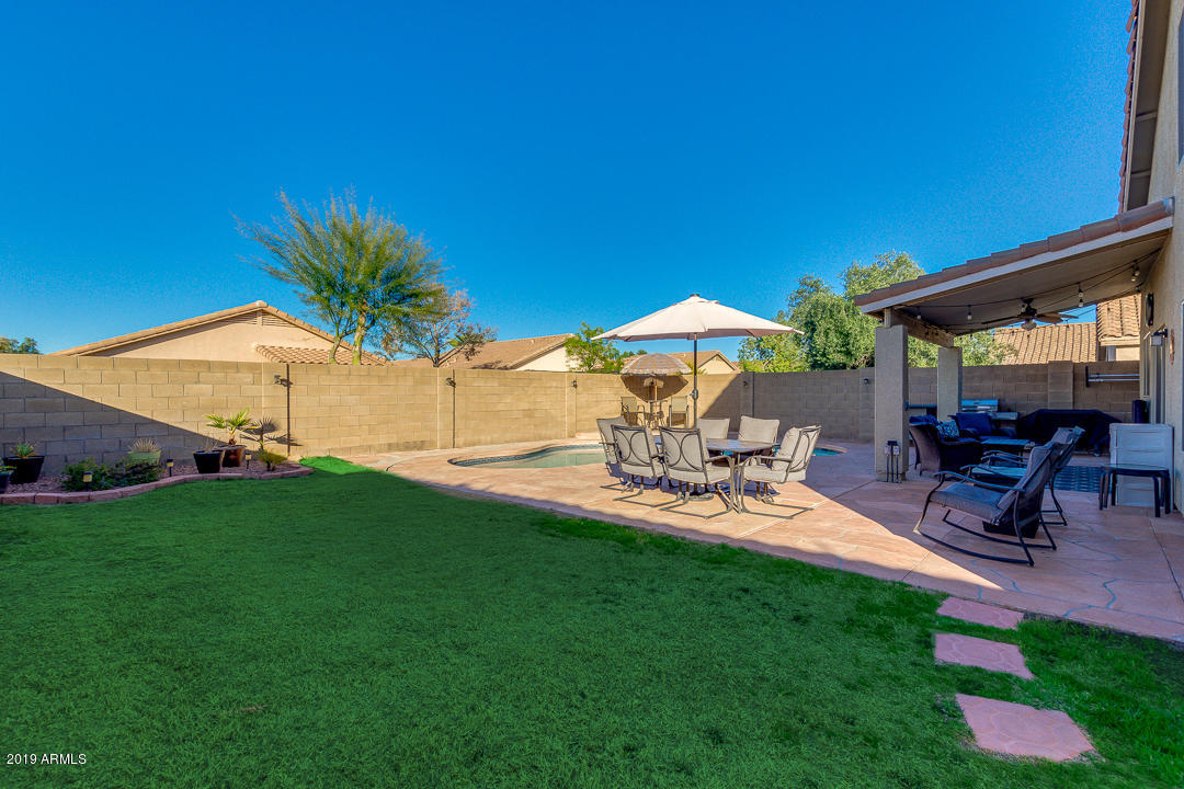 7020 West Phelps Road Peoria, AZ 85382 - Photo 31 of 35 Inviting Backyard