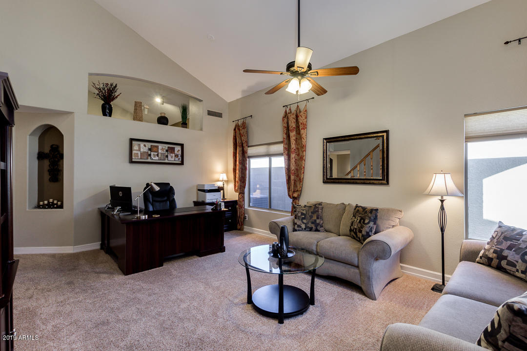 7020 West Phelps Road Peoria, AZ 85382 - Photo 4 of 35 Living Room w/ Soaring Ceilings