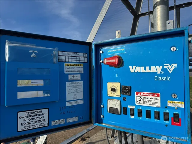 a view of a room with furniture and window