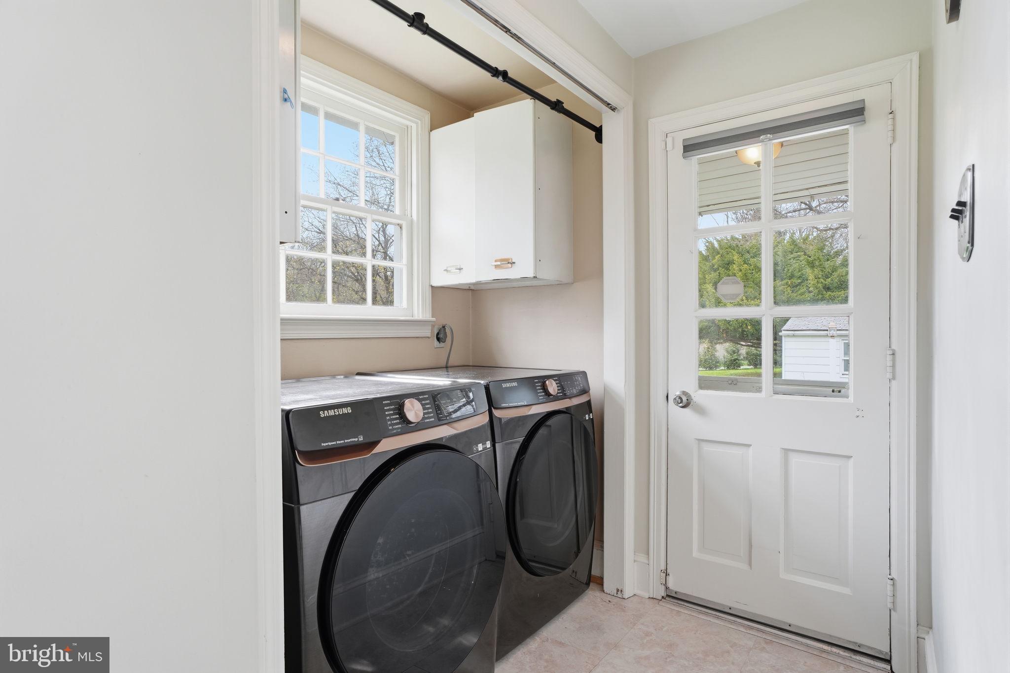 448 Moredon Road Huntingdon Valley, PA 19006 - Photo 16 of 66 a utility room with dryer and washer